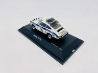 PORSCHE: A 1:43 scale model by Schuco of the Porsche 911 RS #19 "Safari Rally 1974",&nbsp;&nbsp;complete with original packaging [Location: Sydney] - 4