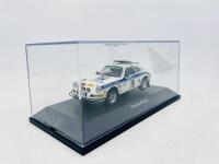 PORSCHE: A 1:43 scale model by Schuco of the Porsche 911 RS #19 "Safari Rally 1974",&nbsp;&nbsp;complete with original packaging [Location: Sydney] - 6