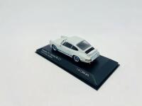 PORSCHE: A 1:43 scale model by Minichamps of the 1973 Porsche 911 RS 2.7, limited edition 1 of 1,584, complete with original packaging [Location: Sydney] - 4