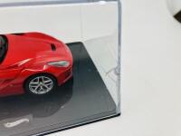 FERRARI: A 1:43 scale model by Hot Wheels&nbsp;of the F12 Berlinetta, in original packaging [Location: Sydney] - 4
