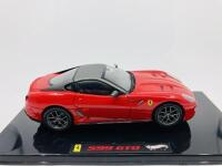 FERRARI: A 1:43 scale model by Hot Wheels of the 599 GTO, in original packaging [Location: Sydney]
