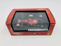 FERRARI: A 1:43 scale model by Hot Wheels of the F14T, in original packaging [Location: Sydney] - 7