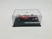 FERRARI: A 1:43 scale model by Hot Wheels of the F138, in original packaging [Location: Sydney] - 3