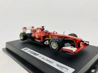 FERRARI: A 1:43 scale model by Hot Wheels of the F138, in original packaging [Location: Sydney] - 4