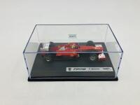 FERRARI: A 1:43 scale model by Hot Wheels of the F2012,&nbsp;in original packaging [Location: Sydney] - 2