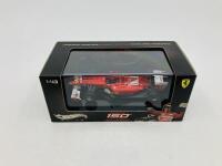 FERRARI: A 1:43 scale model by Hot Wheels of the 150 Italia, in original packaging [Location: Sydney] - 2