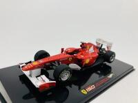 FERRARI: A 1:43 scale model by Hot Wheels of the 150 Italia, in original packaging [Location: Sydney] - 4