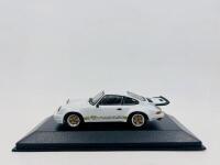 PORSCHE: A 1:43 scale model by Minichamps of the 1974&nbsp;Porsche RS 3.0, limited edition 1 of 7,008 pieces, complete with original packaging [Location: Sydney]