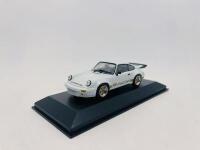 PORSCHE: A 1:43 scale model by Minichamps of the 1974&nbsp;Porsche RS 3.0, limited edition 1 of 7,008 pieces, complete with original packaging [Location: Sydney] - 2