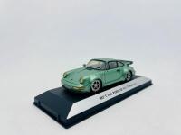 PORSCHE: A 1:43 scale model by Starter&nbsp;of the Porsche 911 (964) Turbo 3.6, complete with original packaging [Location: Sydney] - 2