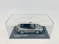 PORSCHE: A 1:43 scale model by Minichamps of the 2003 Porsche 911 (996) Carrera 4S Cabriolet, limited edition 1 of 2,208&nbsp;pieces, complete with original packaging [Location: Sydney] - 6