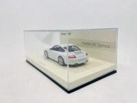 PORSCHE: A 1:43 scale model by Minichamps of the Porsche 911 (997) Carrera&nbsp;S, limited edition 1 of 2,008 pieces, complete with original packaging [Location: Sydney]&nbsp; - 8