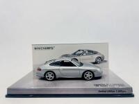 PORSCHE: A 1:43 scale model by Minichamps of the Porsche 911 (996.2) Carrera 40th Anniversary, limited edition 1 of 1,008&nbsp;pieces, complete with original packaging [Location: Sydney]