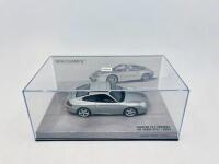 PORSCHE: A 1:43 scale model by Minichamps of the Porsche 911 (996.2) Carrera 40th Anniversary, limited edition 1 of 1,008&nbsp;pieces, complete with original packaging [Location: Sydney] - 6