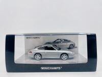 PORSCHE: A 1:43 scale model by Minichamps of the Porsche 911 (996.2) Carrera 40th Anniversary, limited edition 1 of 1,008&nbsp;pieces, complete with original packaging [Location: Sydney] - 8