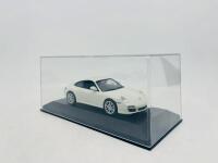 PORSCHE: A 1:43 scale model by Minichamps of the Porsche 911 (997) Carrera 4S, complete with original packaging [Location: Sydney] - 7