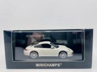 PORSCHE: A 1:43 scale model by Minichamps of the Porsche 911 (997) Carrera 4S, complete with original packaging [Location: Sydney] - 8