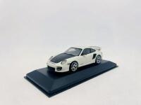 PORSCHE: A 1:43 scale model by Minichamps of the 2010 Porsche GT2 RS (997.2), limited edition 357/500, complete with original packaging [Location: Sydney] - 2