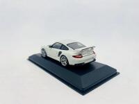 PORSCHE: A 1:43 scale model by Minichamps of the 2010 Porsche GT2 RS (997.2), limited edition 357/500, complete with original packaging [Location: Sydney] - 3