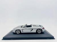 PORSCHE: A 1:43 scale model by Minichamps of the 2001 Porsche Carrera GT Concept, limited edition 1 of 1,008 pieces, complete with original packaging [Location: Sydney]