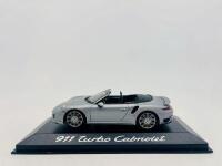 PORSCHE: A 1:43 scale model by Minichamps of the Porsche 911 (991) Turbo&nbsp;Cabriolet,&nbsp;complete with original packaging [Location: Sydney]