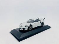 PORSCHE: A 1:43 scale model by Minichamps of the Porsche 911 (991) GT3 RS, complete with original packaging [Location: Sydney] - 2