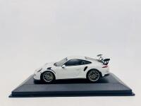 PORSCHE: A 1:43 scale model by Minichamps of the Porsche 911 (991) GT3 RS, complete with original packaging [Location: Sydney]
