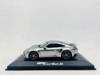 PORSCHE: A 1:43 scale model by Minichamps of the Porsche 911 (992) Turbo S, complete with original packaging [Location: Sydney]