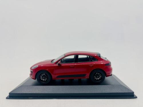 PORSCHE: A 1:43 scale model by Minichamps of the Porsche Macan GTS, complete with original packaging [Location: Sydney]