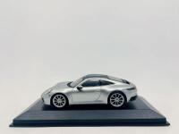 PORSCHE: A 1:43 scale model by Minichamps of the Porsche 911 (992)&nbsp;Carrera S, complete with original packaging [Location: Sydney]