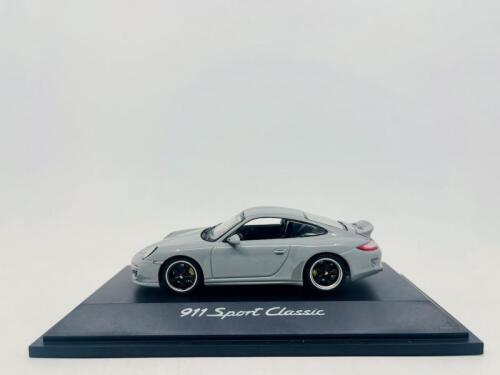 PORSCHE: A 1:43 scale model by Schuco of the Porsche 911 (997) Sport Classic, complete with original packaging [Location: Sydney]