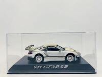 PORSCHE: A 1:43 scale model by Norev of the Porsche 911 (997) GT3 RSR, complete with original packaging [Location: Sydney]&nbsp; - 4