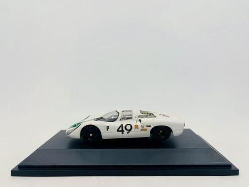 PORSCHE: A 1:43 scale model by Schuco of the Porsche 907 #49, complete with original packaging [Location: Sydney]