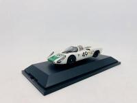 PORSCHE: A 1:43 scale model by Schuco of the Porsche 907 #49,&nbsp;complete with original packaging [Location: Sydney] - 2
