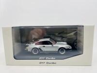 PORSCHE: A box set of 1:43 scale models by Minichamps featuring four generations of the 911 Turbo (930, 964, 993 and 996), limited edition 1 of 5000 pieces&nbsp;, complete with original packaging [Location: Sydney] - 3