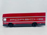 PORSCHE: A 1:43 scale model by Premium Classixxs of the Porsche Racing Transporter, complete with original packaging [Location: Sydney]