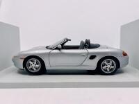 PORSCHE: A 1:18 scale model by UT Models&nbsp;of the Porsche Boxster (986), complete with original packaging [Location: Sydney]