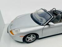 PORSCHE: A 1:18 scale model by UT Models&nbsp;of the Porsche Boxster (986), complete with original packaging [Location: Sydney] - 2