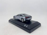 BMW: A 1:43 scale model by BMW of the BMW I8, complete with original packaging. [Location: Sydney] - 3
