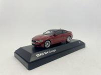 BMW: A 1:43 scale model by BMW of the BMW M4, complete with original packaging. [Location: Sydney] - 2