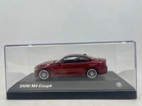 BMW: A 1:43 scale model by BMW of the BMW M4, complete with original packaging. [Location: Sydney] - 4