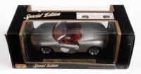 PORSCHE: A 1:18 scale Porsche Boxster, silver colour, by Maisto Models,&nbsp;damaged box
