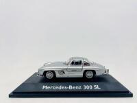 MERCEDES-BENZ: A 1:43 scale model by Schuco of the Mercedes-Benz 300 SL, complete with original packaging [Location: Sydney]
