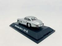 MERCEDES-BENZ: A 1:43 scale model by Schuco of the Mercedes-Benz 300 SL, complete with original packaging [Location: Sydney] - 3