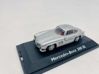 MERCEDES-BENZ: A 1:43 scale model by Schuco of the Mercedes-Benz 300 SL, complete with original packaging [Location: Sydney] - 4