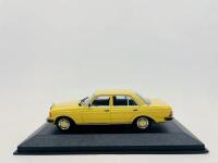 MERCEDES-BENZ: A 1:43 scale model by Minichamps of the Mercedes-Benz E-Class Sedan (W123), complete with original packaging [Location: Sydney]