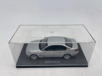 BMW: A 1:43 scale model by Kyosho of the BMW 545i Sedan, complete with original packaging. [Location: Sydney] - 6