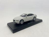 BMW: A 1:43 scale model by Kyosho of the BMW 6 Series Coupe, complete with original packaging. [Location: Sydney] - 2