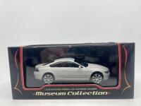 BMW: A 1:43 scale model by Kyosho of the BMW 6 Series Coupe, complete with original packaging. [Location: Sydney] - 7
