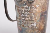 BOB CHAMBERLAIN: A silver plated trophy awarded to Bob Chamberlain at Phillip Island, engraved 'Australian Grand Prix - Golden Jubilee - Phillip Island - 12-3-1978 - Oldest Australian Grand Prix Driver - Bob Chamberlain', 11.5cm high, 10cm wide - 2